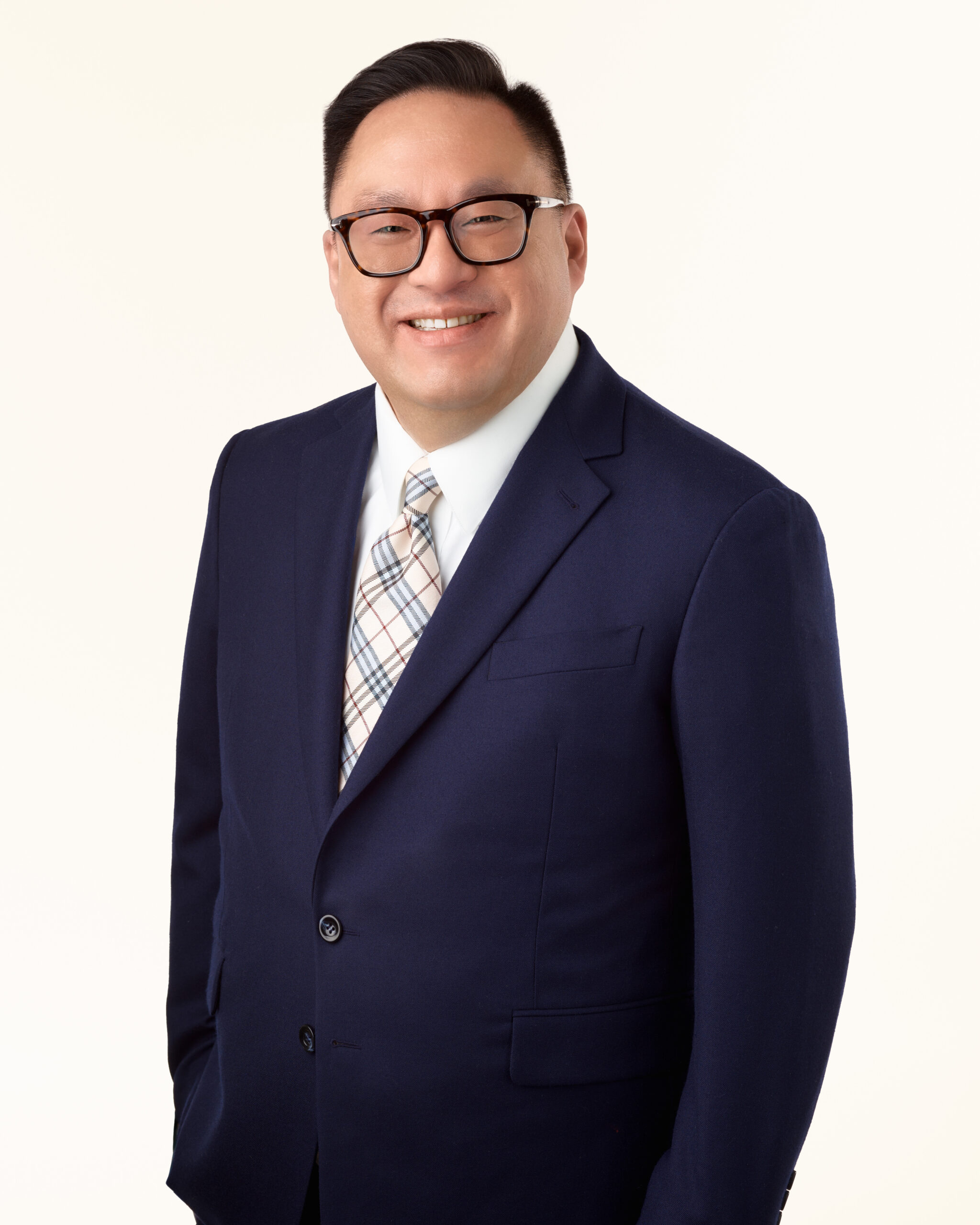 Portrait on White Christopher Tan - Partner